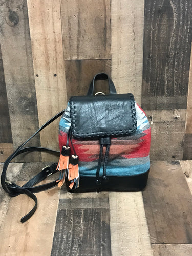 If you ladies don't grab these fast they be gone before you blink! These Kourtney 2-Tone Backpacks are boutique favorite! They have vegan, brown removable/adjustable straps for a single carry, spacious inside, adjustable drawstring and cute tassles for style! Available in Boho-Rust and Aztec-Red!
