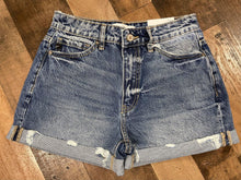 Load image into Gallery viewer, Strut your stuff this summer in our Summer Time Fine Shorts! They are a medium wash denim short with rolled bottoms. These shorts are the perfect blend of traditional and trendy. Tuck a cute graphic tee in to these throw on some turquoise jewelry and take on a country concert. 
