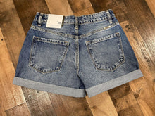 Load image into Gallery viewer, Strut your stuff this summer in our Summer Time Fine Shorts! They are a medium wash denim short with rolled bottoms. These shorts are the perfect blend of traditional and trendy. Tuck a cute graphic tee in to these throw on some turquoise jewelry and take on a country concert. 
