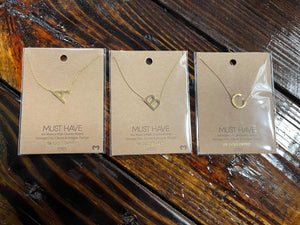 Spice up your look with one of these beautiful initial necklaces. These are 18K Gold dipped necklaces with a small initial on a thin chain. The chain has an approximate Length: 17". They are so great to add to any look and even look super cute stacked together! Scoop one of these up today!
