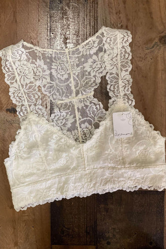 Our Pursuit of Happiness Bralette is what you're closet is missing! She is a classic racerback lace bralette with scalloped edges and a low sweetheart neckline. She is lined but not padded. She features the perfect amount of stretch that allows you to feel comfortable while still looking fabulous. You can wear her all year around with a variety of ways to style her. Material Content: 90% Nylon/10% Spandex/Lining 100% Cotton  Estimated Sizing: S: 32B, 34A, 34B     M: 34B, 34C, 36B     L: 36B, 36C, 38B,38C
