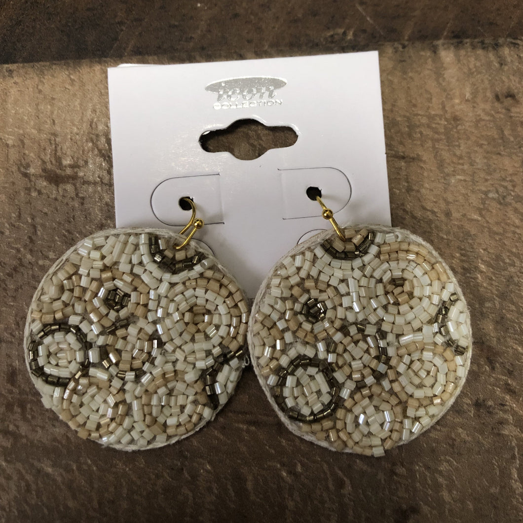 Our Ava Earring is a seed beaded disc earring!