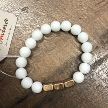 Load image into Gallery viewer, Our  Scarlett Bead Bracelet has stone/metal beads and is a stretch elastic! She comes in Beige and White!
