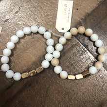 Load image into Gallery viewer, Our  Scarlett Bead Bracelet has stone/metal beads and is a stretch elastic! She comes in Beige and White!
