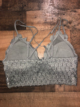 Load image into Gallery viewer, Our Simplicity is Key Bralette is a necessity! She is the perfect piece to wear under your slouchy tees and oversized sweaters. She is a lace detailed bralette with double spaghetti straps on both shoulders and an elastic band on the back. She is padded, but the padding is removable. Her straps are adjustable to provide the perfect fit every time. With a variety of colors and sizes available, we are sure our Simplicity is Key Bralette will be a go-to item in your closet.
