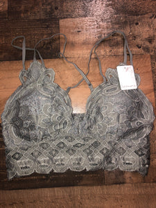 Our Simplicity is Key Bralette is a necessity! She is the perfect piece to wear under your slouchy tees and oversized sweaters. She is a lace detailed bralette with double spaghetti straps on both shoulders and an elastic band on the back. She is padded, but the padding is removable. Her straps are adjustable to provide the perfect fit every time. With a variety of colors and sizes available, we are sure our Simplicity is Key Bralette will be a go-to item in your closet.