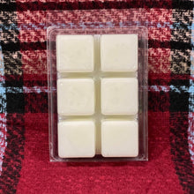 Load image into Gallery viewer, Our Fireside Wax Melt Bar is not your average wax melt bar. She is a HUGE wax melt bar, with each cube having a burn time of 20+ hours. She has 5.5 oz. of wax and is divided into 6 large cubes. She has the scent of smoke and wood blended with clove, amber, sandalwood, and patchouli. She is made from a premium soy blend and is hand poured in Raeford, North Carolina.   Due to the large size of the cubes, it is recommended to start with one cube in your warmer.
